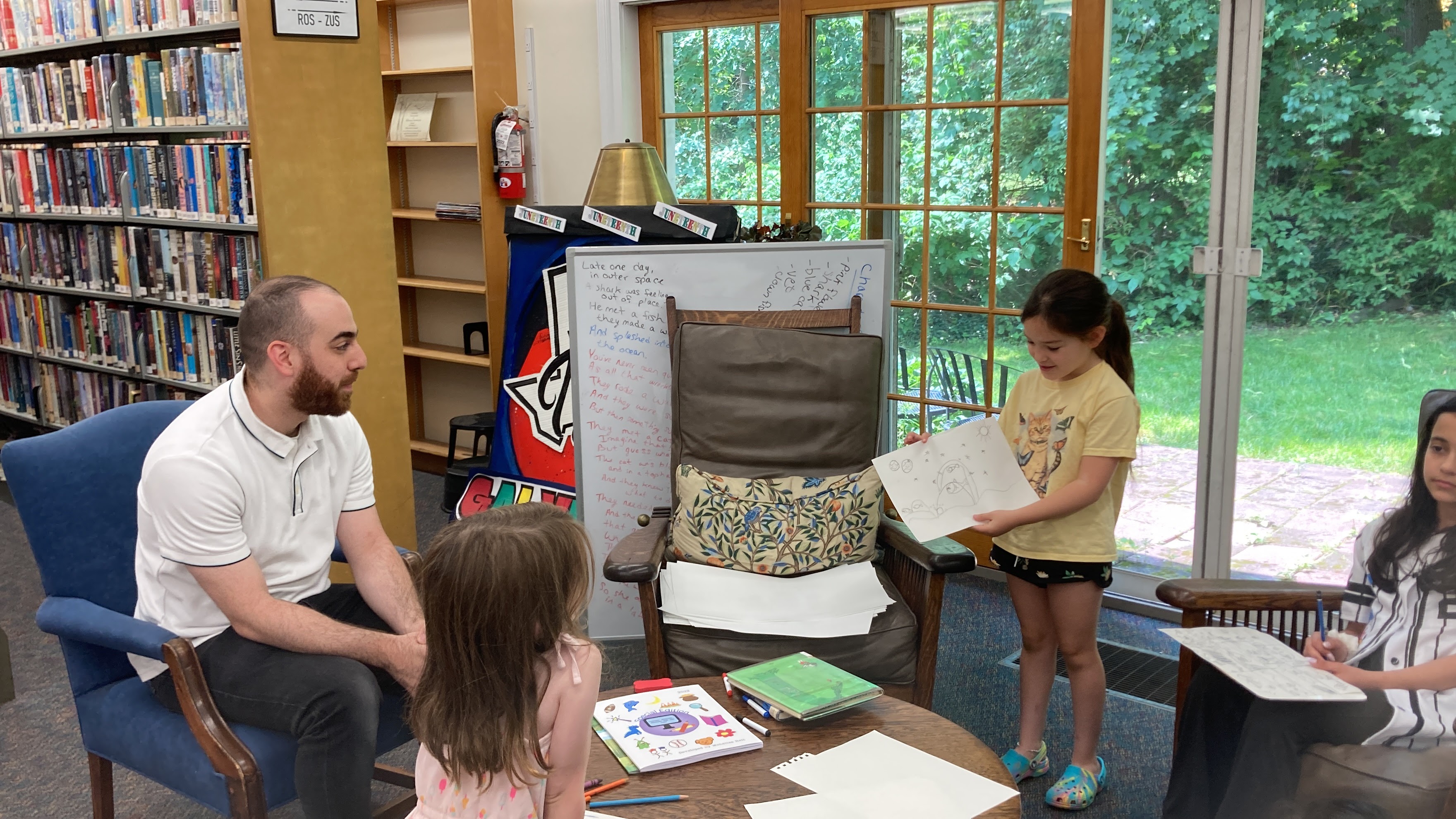 Child showing a drawing