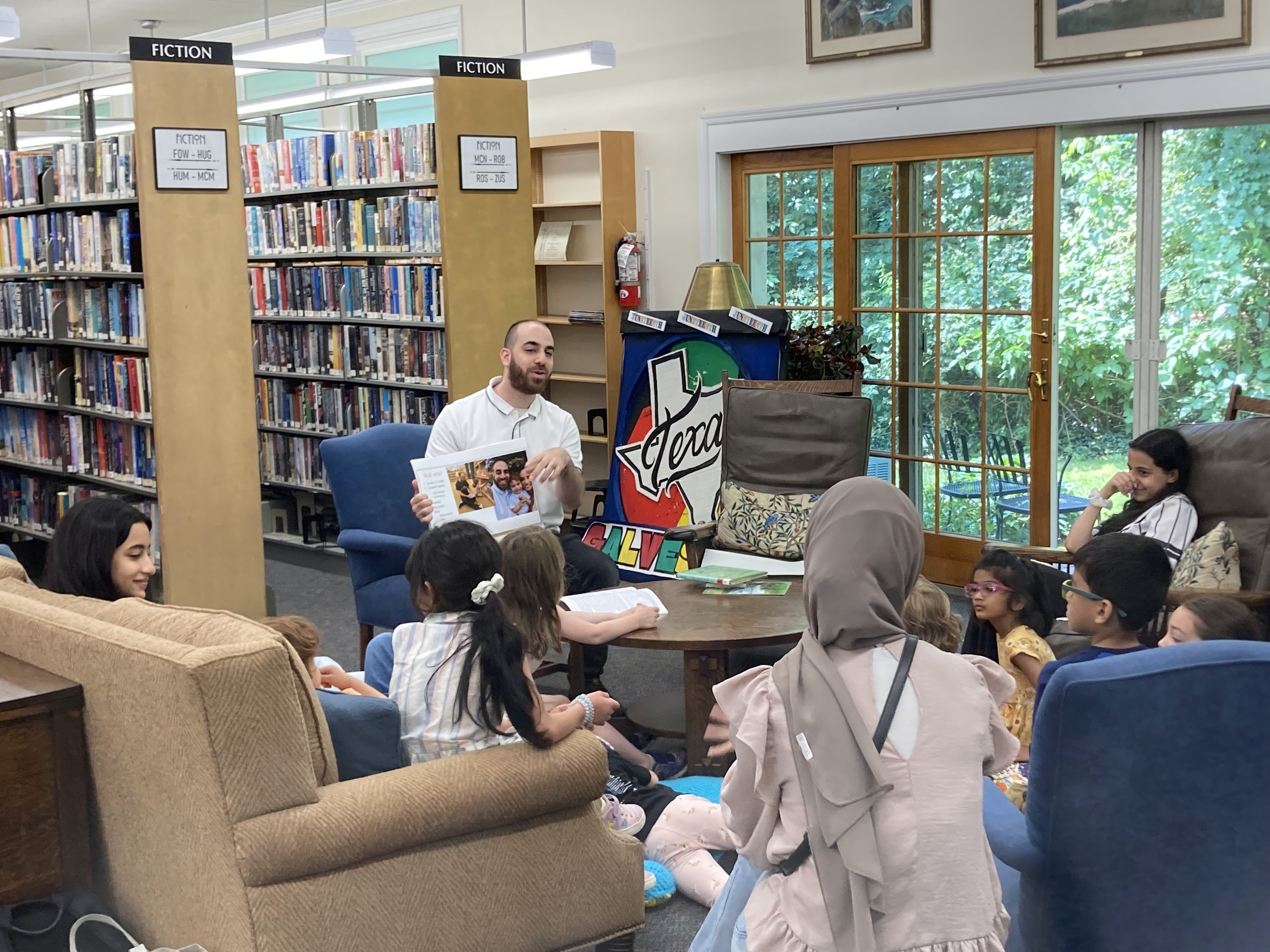 Omar presenting to children