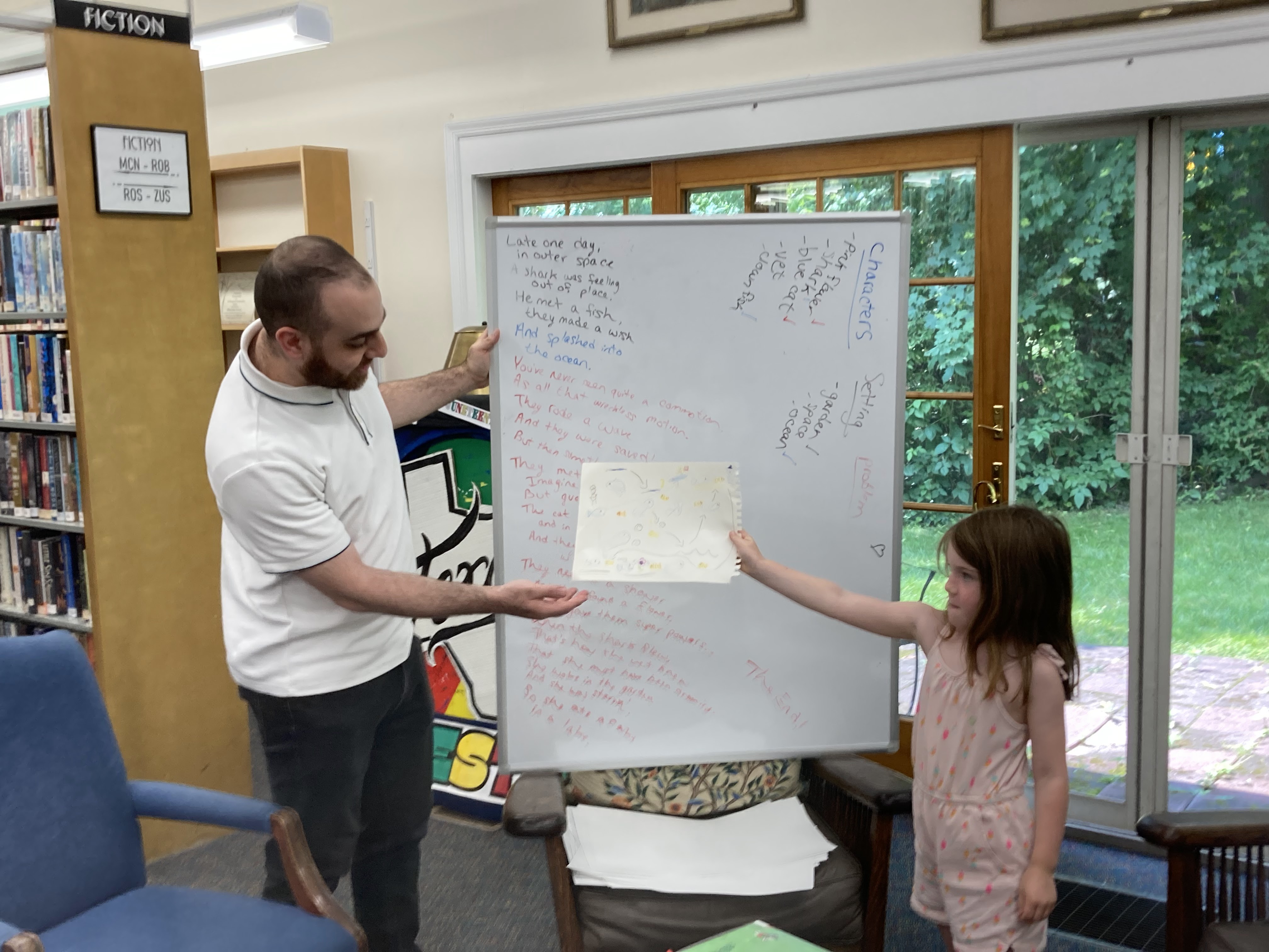 Child showing a drawing