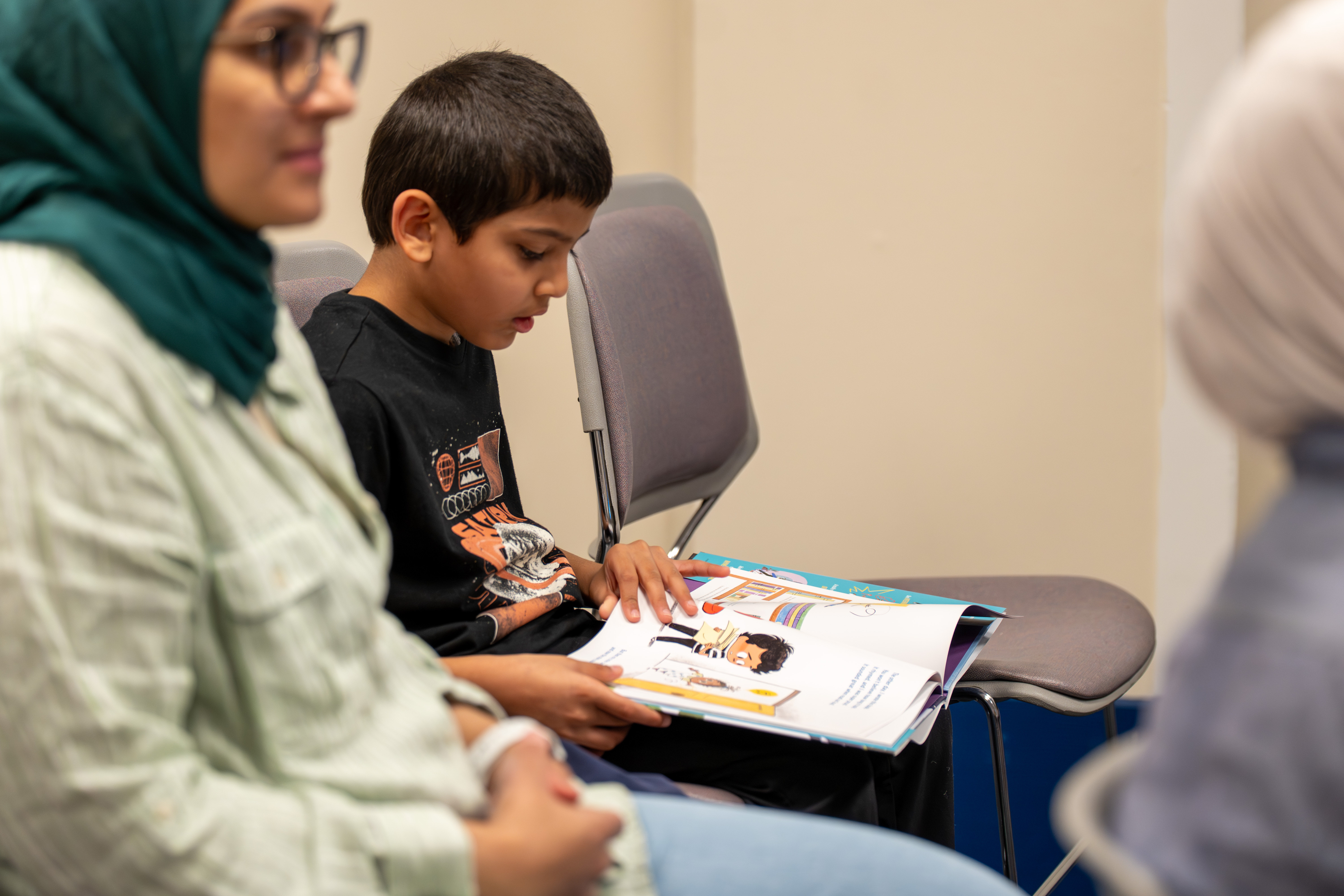 A child reading The Book That Almost Rhymed