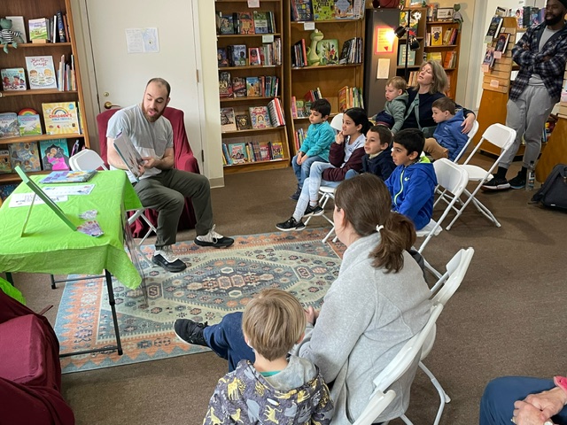 Omar reading at Hooray for Books