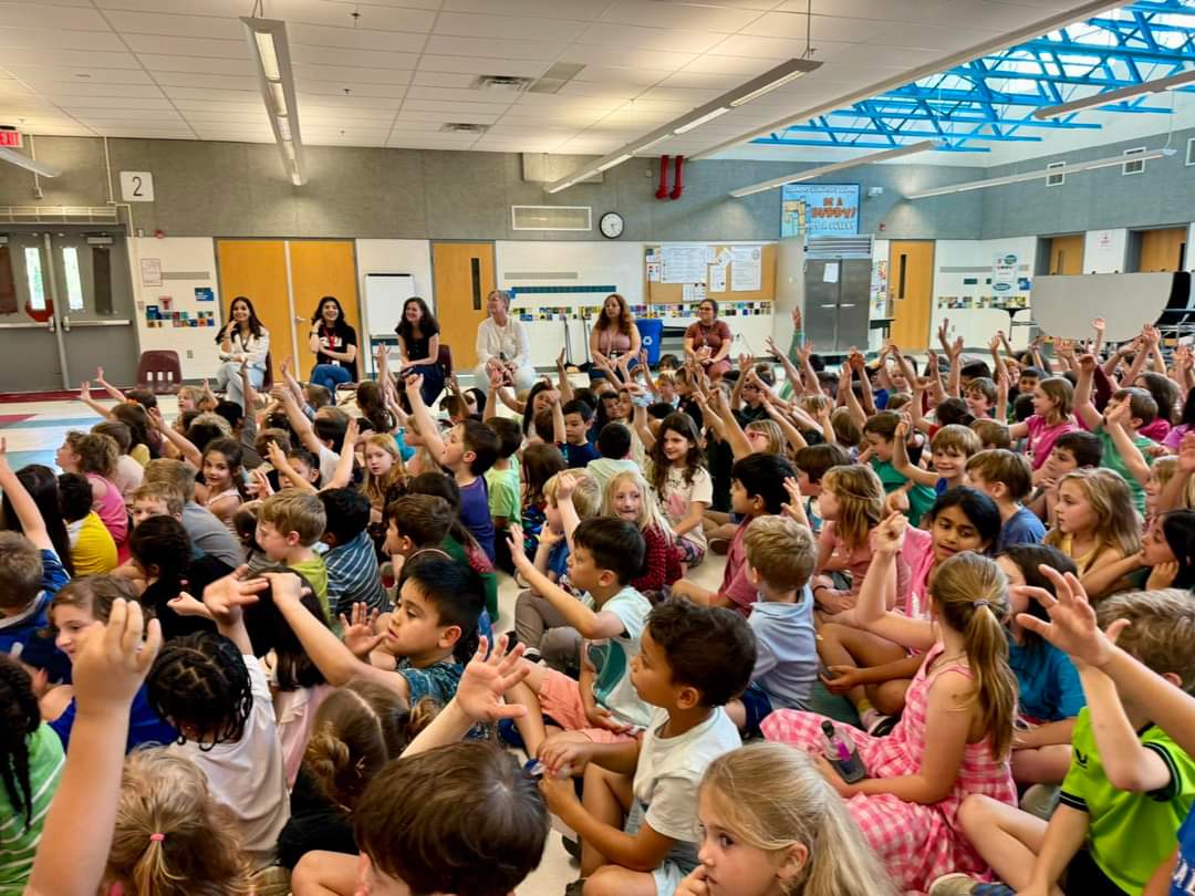 Students raising their hands