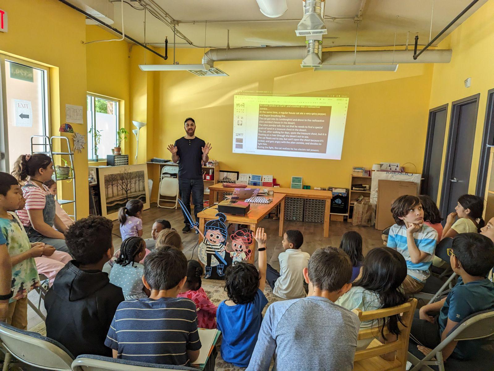 Omar presenting to students at Medina Montessori