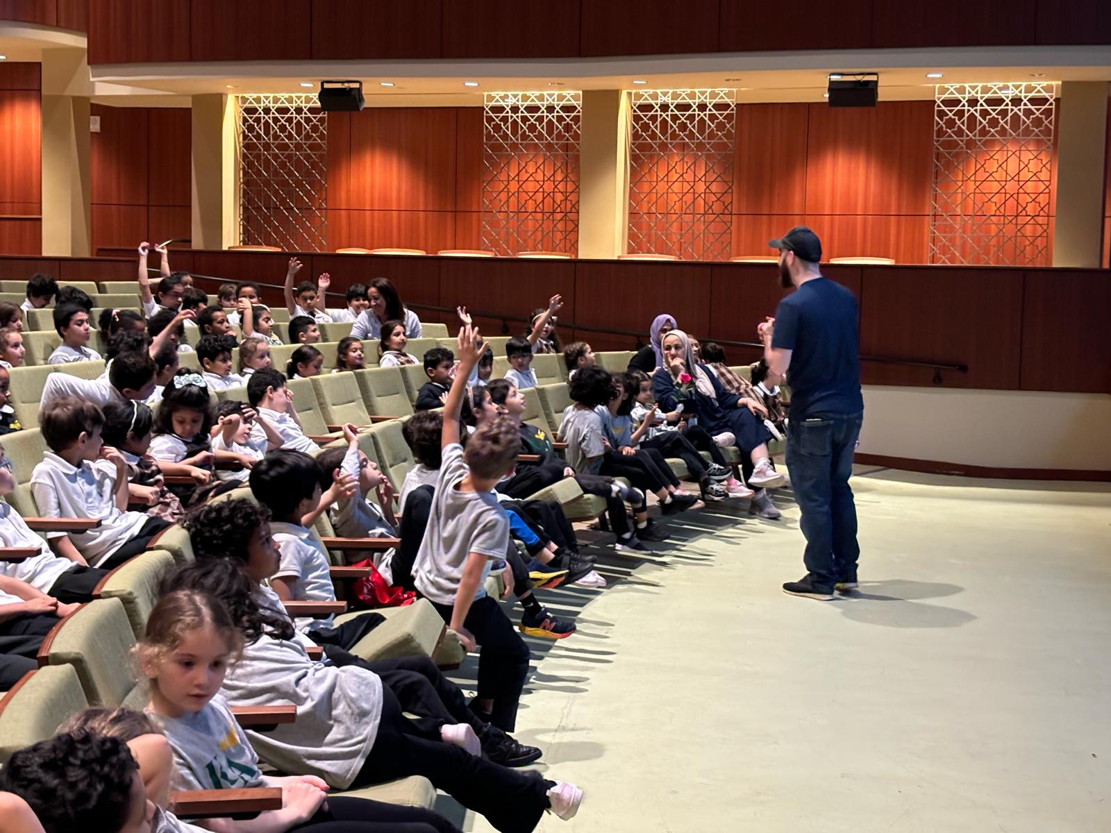 Omar presenting to students at KAA